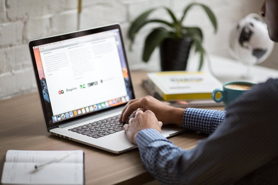 Developer working on a website on a laptop
